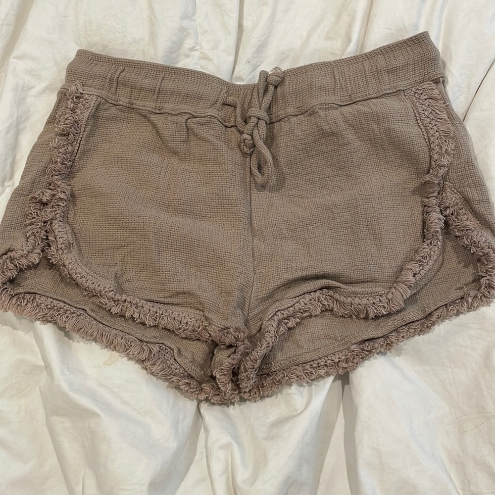 Tan shorts.